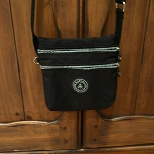 Aocina lightweight black bag with silver zippers. Crossbody.